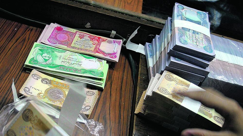 ميليشيات العراق تقود عمليات تزوير وغسيل أموال «الملالي»
